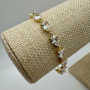 Elegant Pear Crystal and Gold Tone Tennis Bracelet